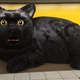 Illustration for article titled Freaky Giant Cat Also Has A Big Heart